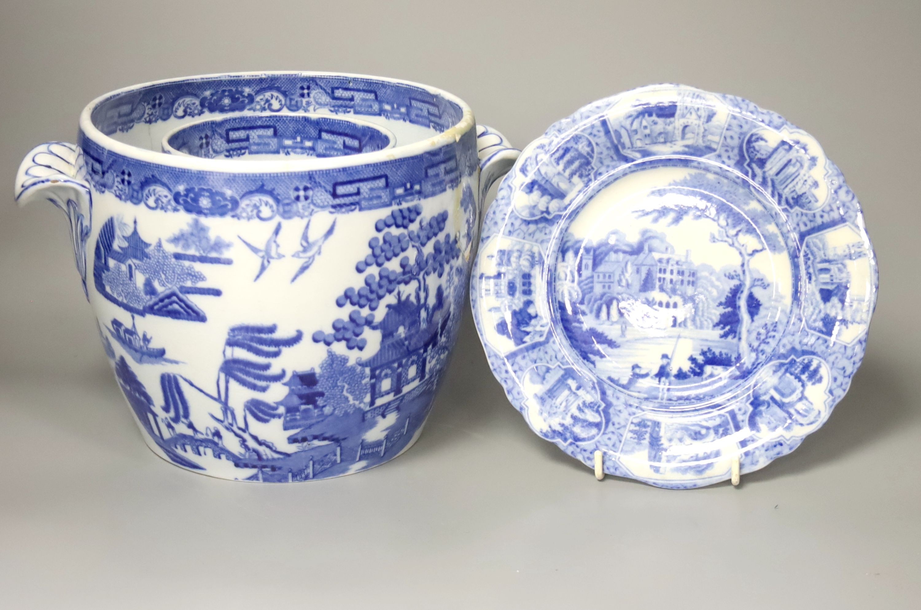 A Victorian blue-printed earthenware wine cooler (a.f.) 18cm high and a Victorian pearlware plate